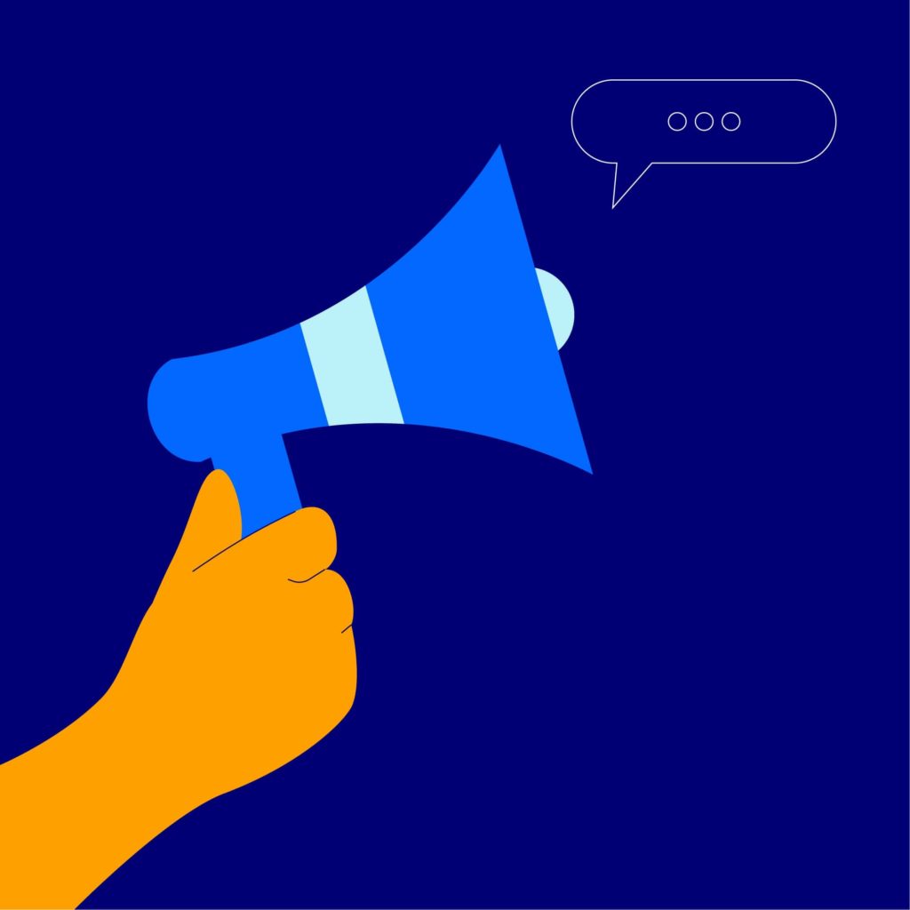 An illustration showing a hand holding a megaphone, representing Mindful Education spreading the word about the benefits of a professional Online and On Campus course.
