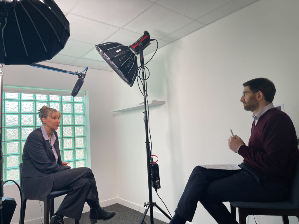 A Mindful Education employee interviewing a member of staff at Westminster Adult Education Service about delivering professional, blended learning courses in partnership with Mindful Education.