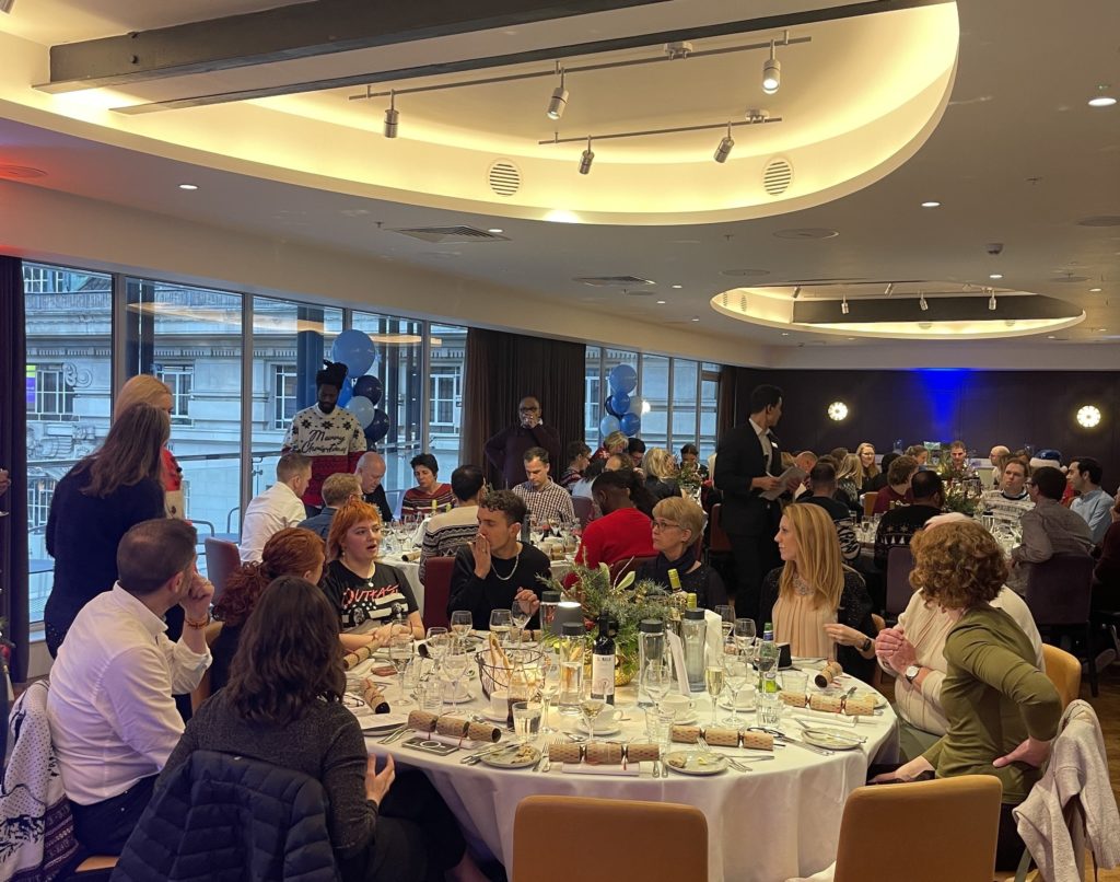 Mindful Education employees at a Winter Conference, enjoying lunch together.