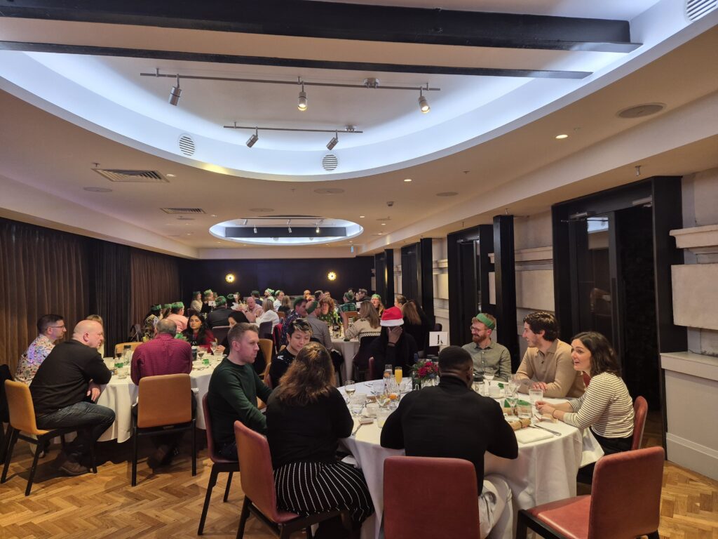 Mindful Education employees at a Winter Conference, enjoying lunch together.