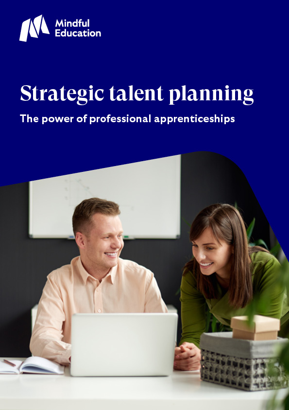Cover image of the Mindful Education thought piece titled 'Strategic talent planning: The power of professional apprenticeships' The cover image features two colleagues smiling and working from a laptop.