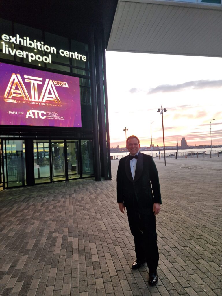 Mindful Educations, Managing Director, standing outside a venue, ready to attend an established awards ceremony.
