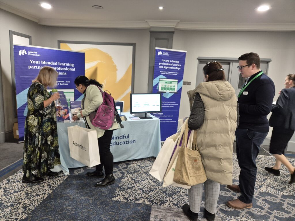 An image of professionals in accounting gathered at an event to learn more about Mindful Education's hybrid learning accounting courses and apprenticeships.