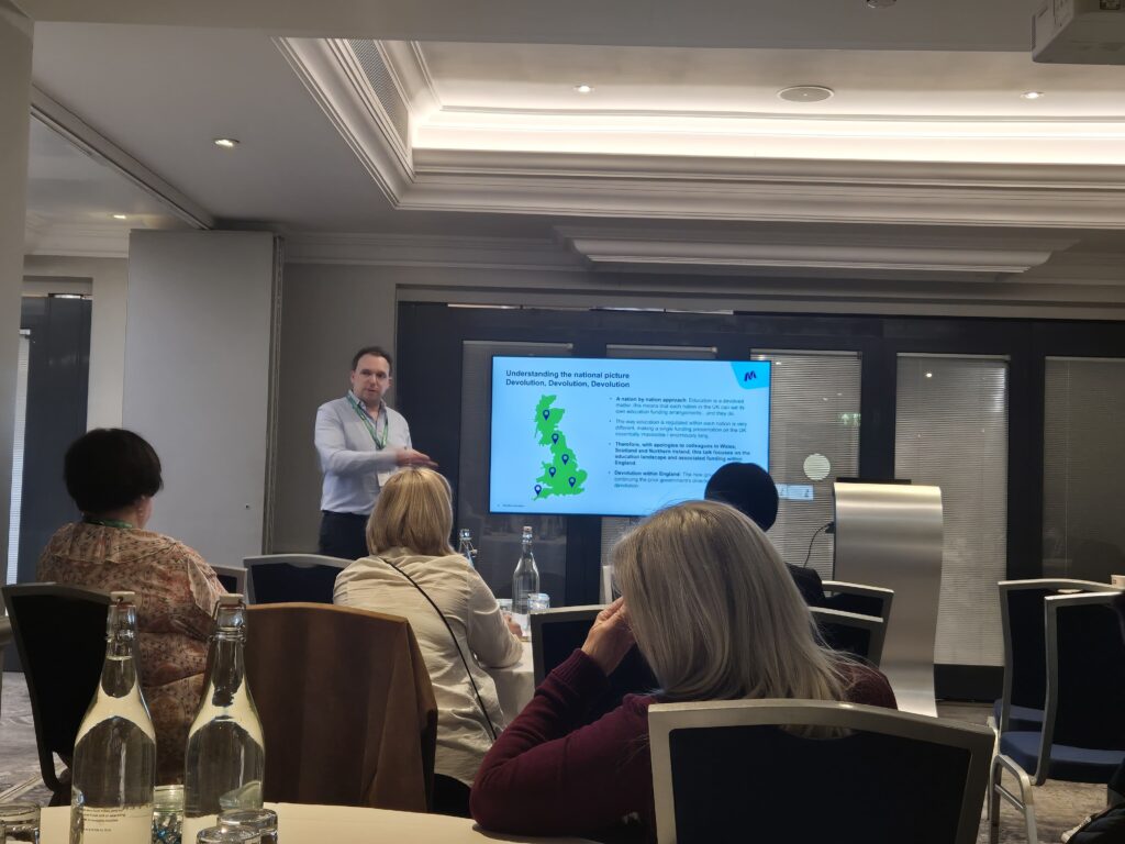 Mindful Educations Managing Director delivering a talk about funding for courses in the UK.