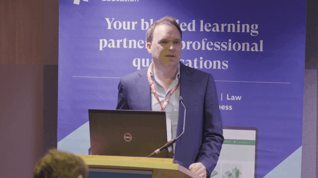 An image of Mindful Education's Managing Director delivering a breakout session at an industry event.