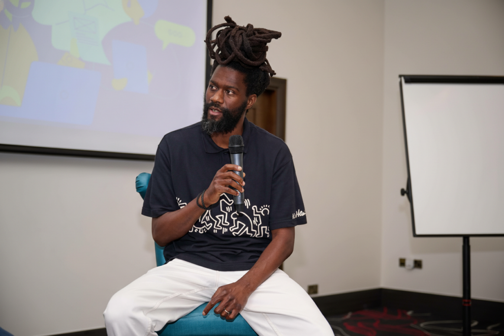 An image of a Mindful Education apprentice speaking about his journey as an adult learner and his success with his professional qualification.